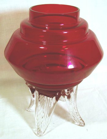 Lantern shaped red vase on three crystal legs by Morgantown Glass.
