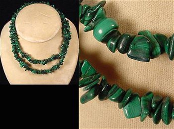 Necklace from stringed various sized malachite stones, polished and smoothed to bring out the grain.