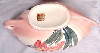Console boat bowl in cream clay by Camark with sticker mark.