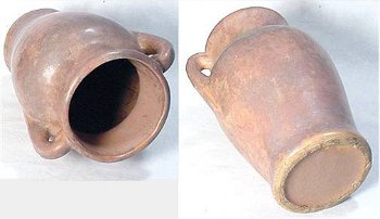 Brown McCoy vase with mottled glaze, which gives it a rustic western look from the uneven coloring.