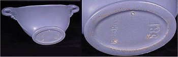 Lavender RumRill 581 console bowl with three clear firing pin marks on foot.