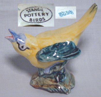 Kentucky Warbler in yellow and blue in mid-song. Stamped "Stangl Pottery Birds 3598"