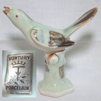 Porcelain bird, possibly a Vireo, light blue with brown highlights. Sticker on base reads "Vontury Porcelain".