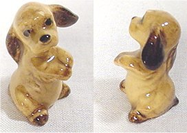 Figurine of brown puppy dog begging by Hagen-Renaker.