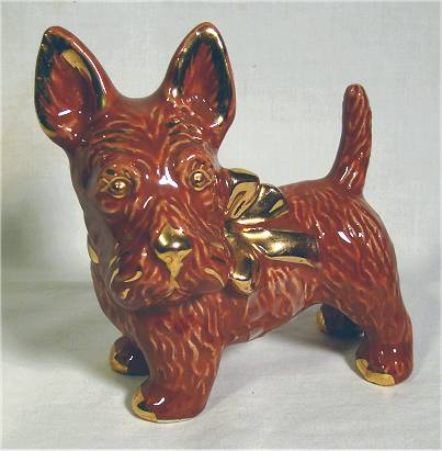 Marked reddish brown scotty dog figurine by LePere Pottery.