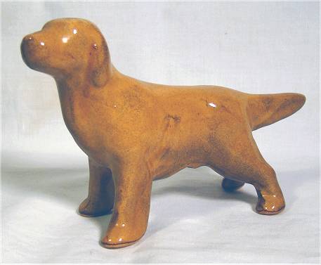 Brown irish setter dog figurine standing at attention with tail straight by Morton Potteries.