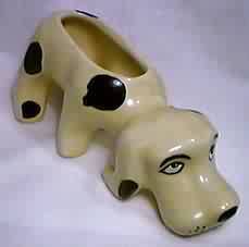 Light tan hound dog with brown spots by Shawnee Pottery of Ohio.