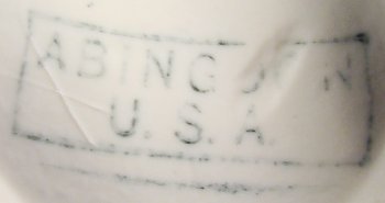 The Abingdon ink stamp mark — block letters spell "Abingdon U.S.A." within a box.