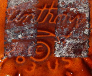 Anthony in-mold mark on Freeman-McFarlin pumpkin vase.