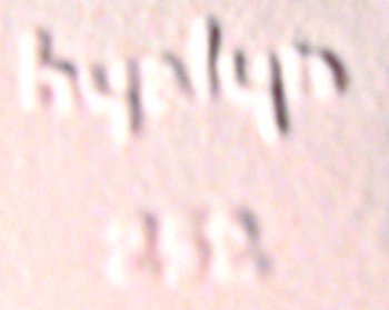 Hyalyn in-mold mark with shape number on pink Hyalyn bowl.
