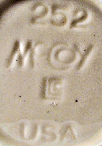 Lancaster Colony Corporation McCoy USA mark on decaled canister 252.