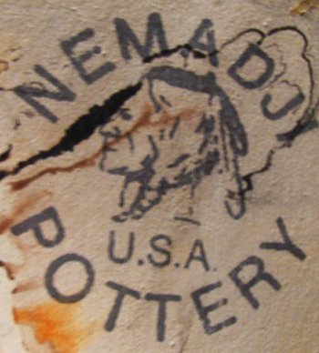 Nemadji Pottery ink stamp mark with Native American logo.