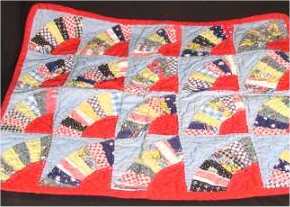 Doll fan quilt made of spare fabric from 1955.